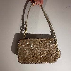 Authentic COACH gold sequin clutch wristlet